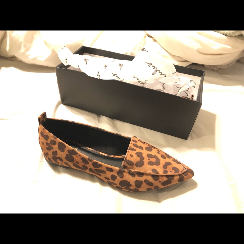 Leopard Flats. Never worn.